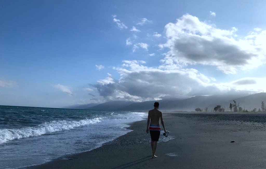 walking along tropical beach in Taitung, Taiwan