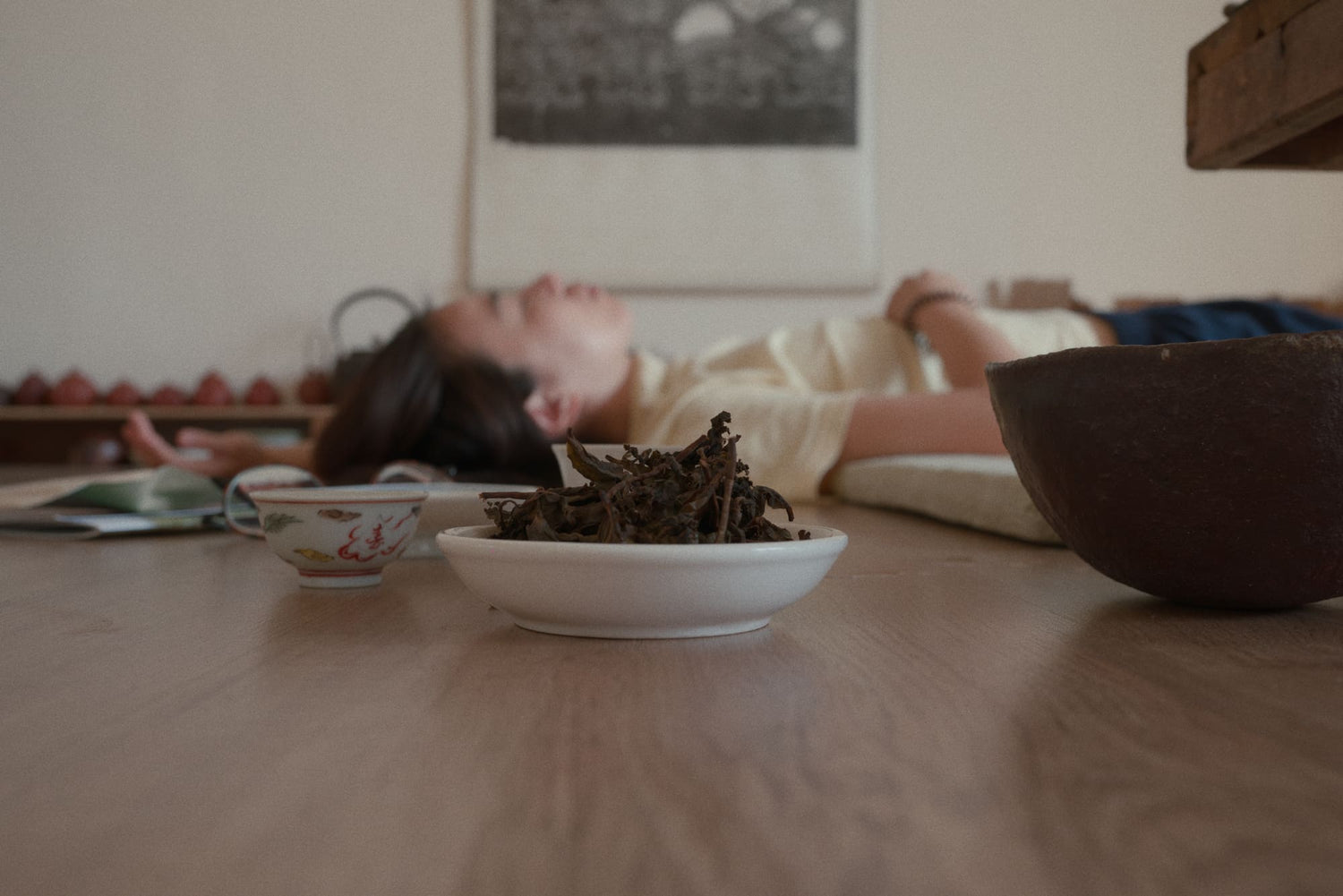 woman deeply relaxing after gongfu tea meditation