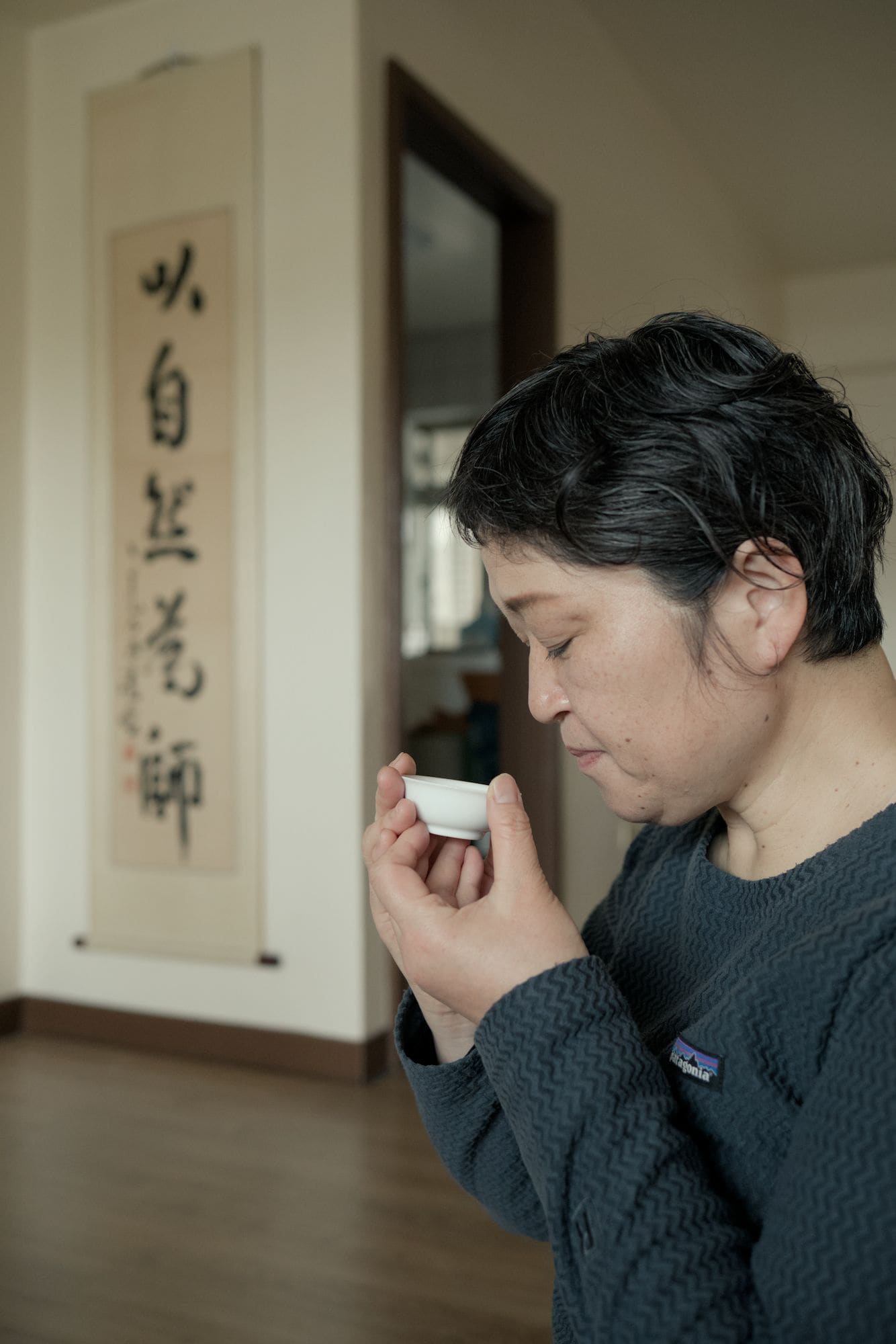 japanese woman during gongfu tea meditation ceremony