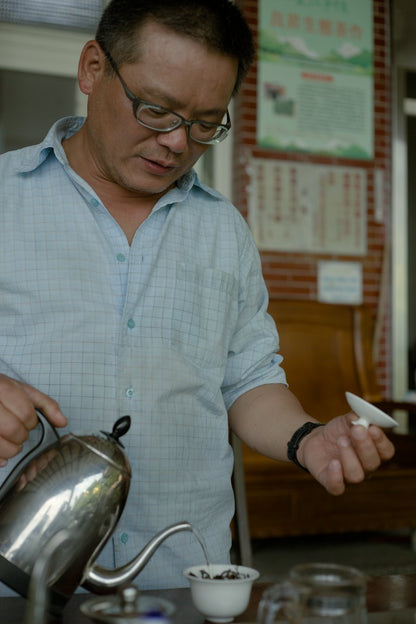 farmer brewing his naturally farmed tea