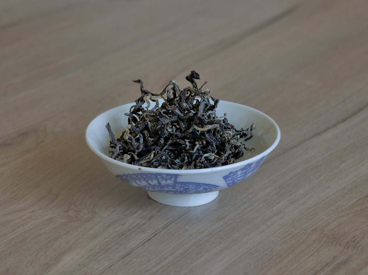 naturally farmed dry yellow tea leaves in gaiwan
