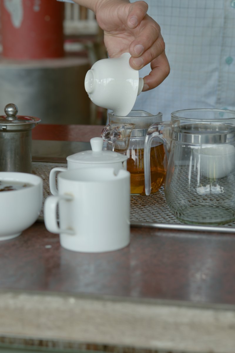 pouring naturally farmed yellow tea out of gaiwan