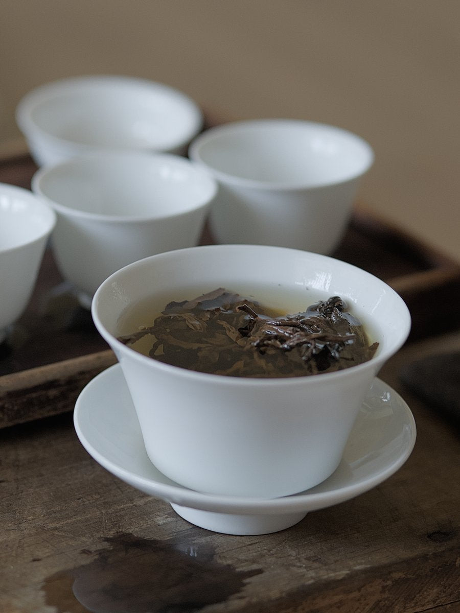 steeping organic Shan Yun black tea leaves in gaiwan