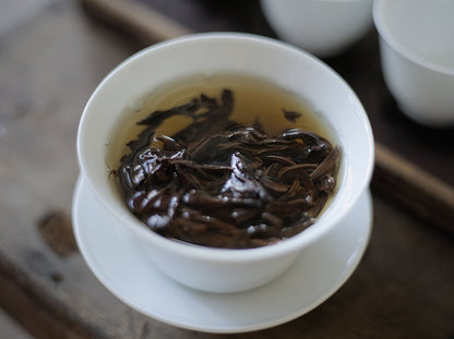 steeping naturally farmed Ruby Red Jade black tea leaves in a gaiwan