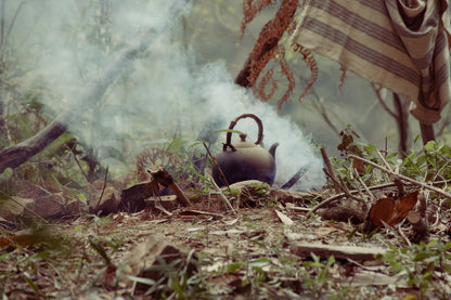 wood fired tea kettle smoking in taiwanese mountains